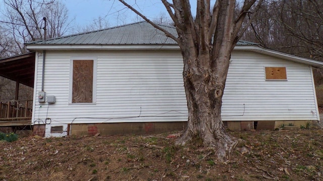 1466 State Route 56, Nelsonville, OH 45764 - view of side of home with crawl space and metal roof