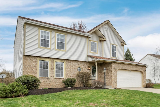 view of front facade with an attached garage, driveway, a front yard, and brick siding