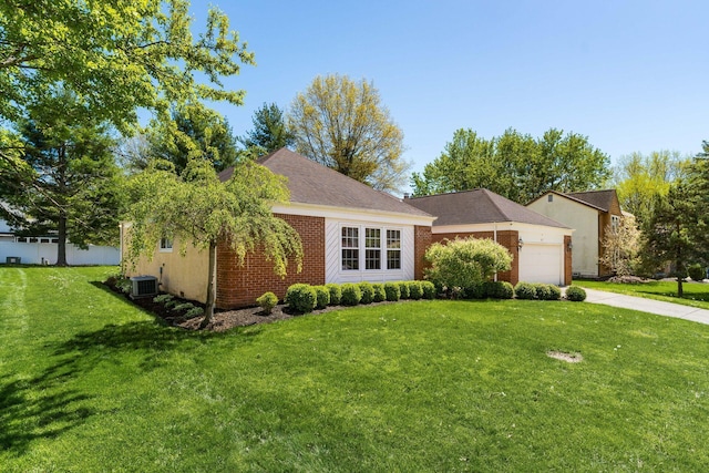 ranch-style home featuring a front yard, brick siding, central AC, concrete driveway, and an attached garage