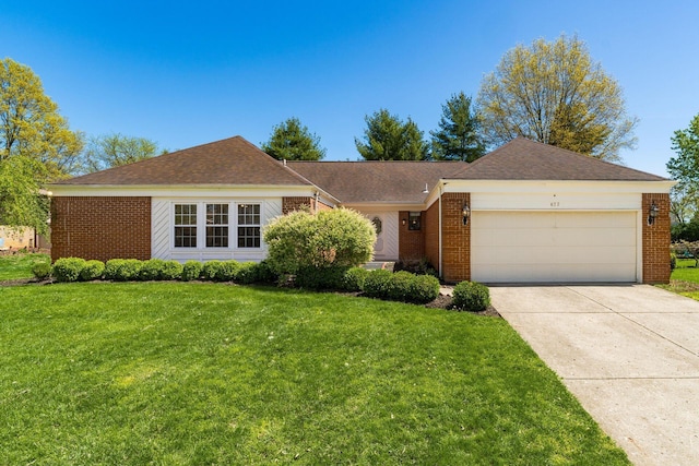 ranch-style home with roof with shingles, a front lawn, brick siding, a garage, and driveway
