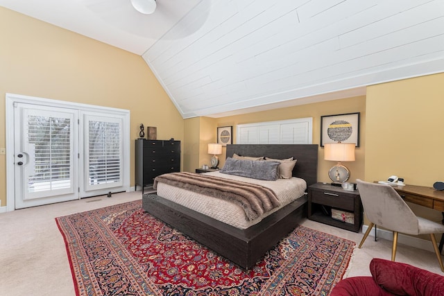 carpeted bedroom featuring access to outside and lofted ceiling