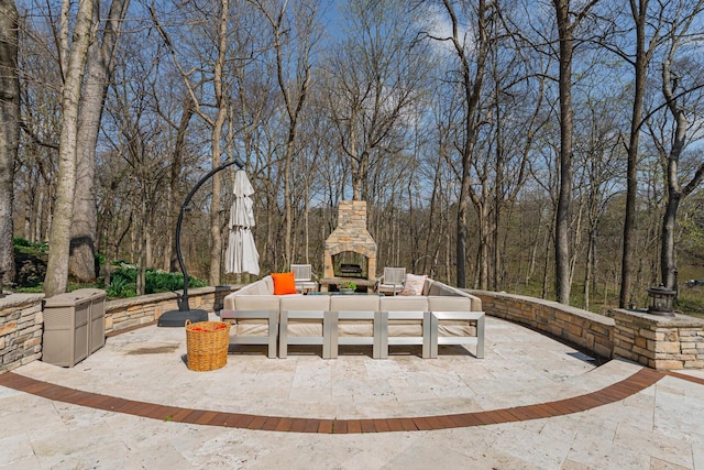 exterior space with an outdoor living space with a fireplace