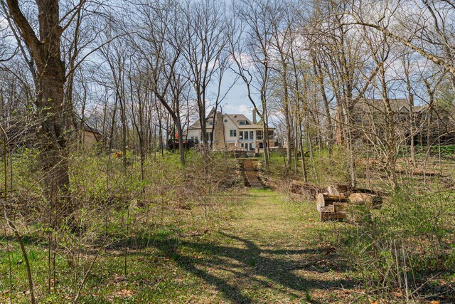 view of yard featuring stairs