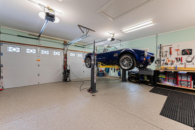 garage featuring a garage door opener