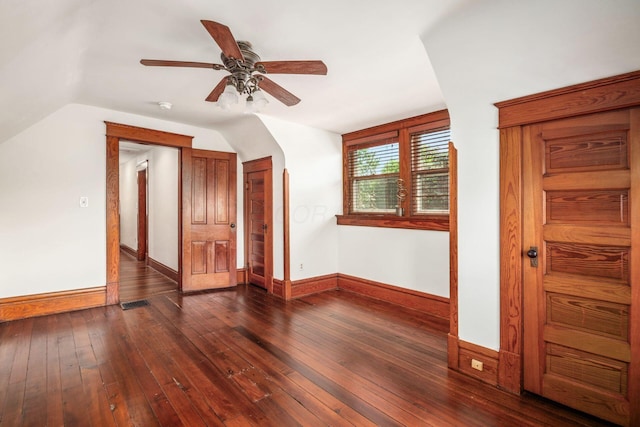 160 E Moler St, Columbus, OH 43207 - spare room featuring lofted ceiling, ceiling fan, baseboards, dark wood-style floors, and a smoke detector