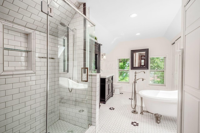 160 E Moler St, Columbus, OH 43207 - full bath with a shower stall, lofted ceiling, a freestanding tub, vanity, and recessed lighting