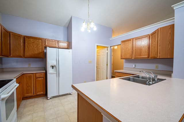 kitchen with a notable chandelier, a sink, brown cabinets, and white appliances