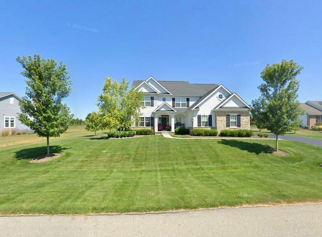 view of front facade with a front yard