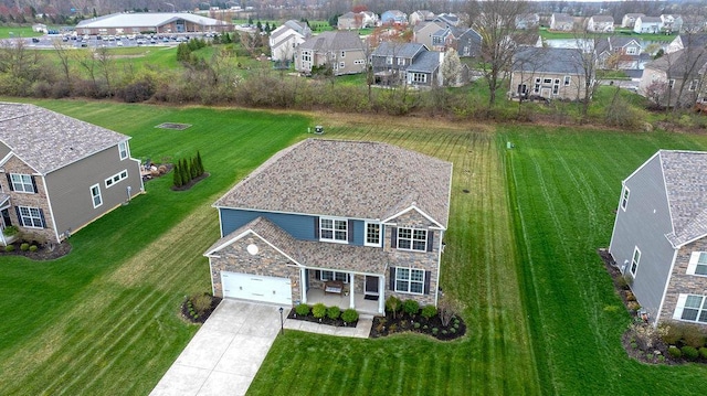 drone / aerial view featuring a residential view