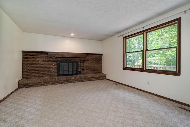 2520 Saltergate Dr, Dublin, OH 43016 - unfurnished living room featuring carpet flooring and a fireplace