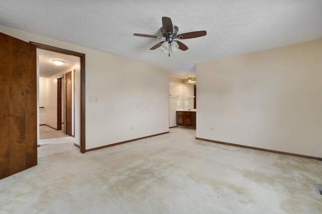 2520 Saltergate Dr, Dublin, OH 43016 - spare room featuring ceiling fan and light carpet