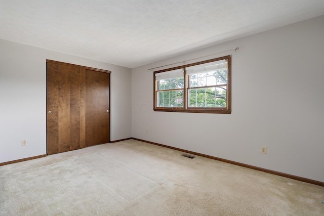2520 Saltergate Dr, Dublin, OH 43016 - unfurnished bedroom with light carpet and a closet