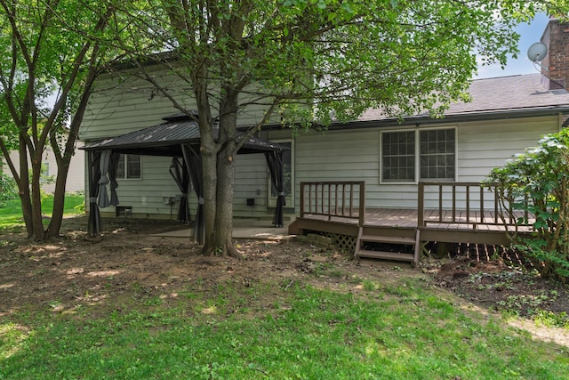 2520 Saltergate Dr, Dublin, OH 43016 - back of house with a gazebo, a deck, and a chimney