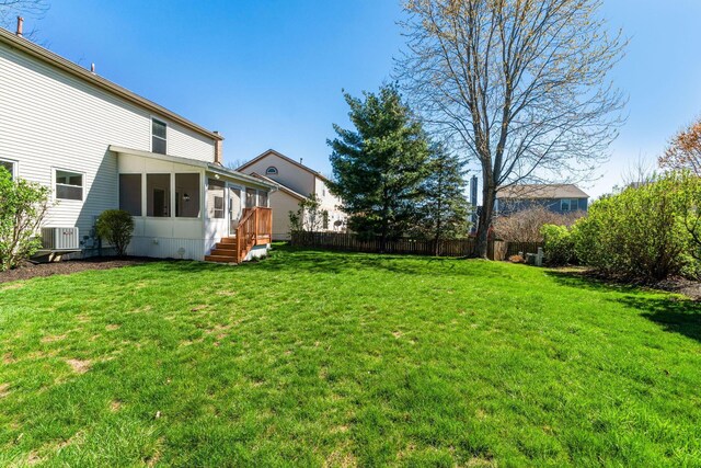 632 Tall Oaks Dr, Gahanna, OH 43230 - view of yard with fence, a sunroom, and cooling unit