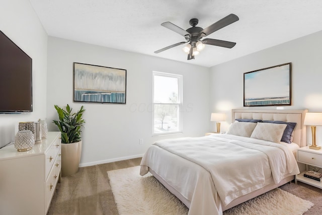 632 Tall Oaks Dr, Gahanna, OH 43230 - bedroom with a ceiling fan, baseboards, and light carpet