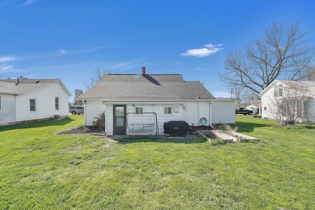 28 Elm St, Kingston, OH 45644 - back of house featuring a shingled roof and a yard