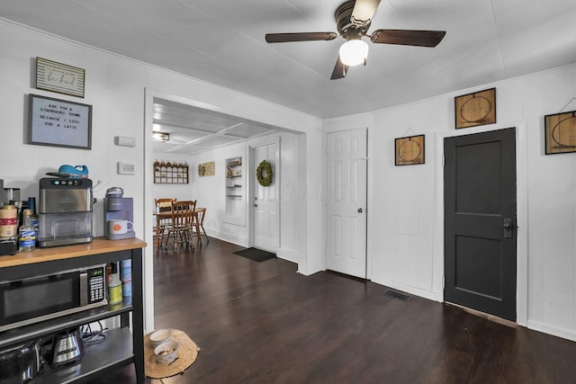 28 Elm St, Kingston, OH 45644 - interior space featuring dark wood-style flooring, visible vents, baseboards, and ceiling fan