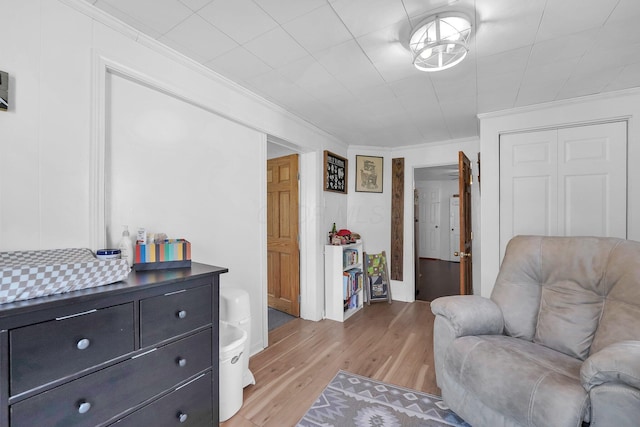 28 Elm St, Kingston, OH 45644 - sitting room featuring light wood-style flooring and crown molding