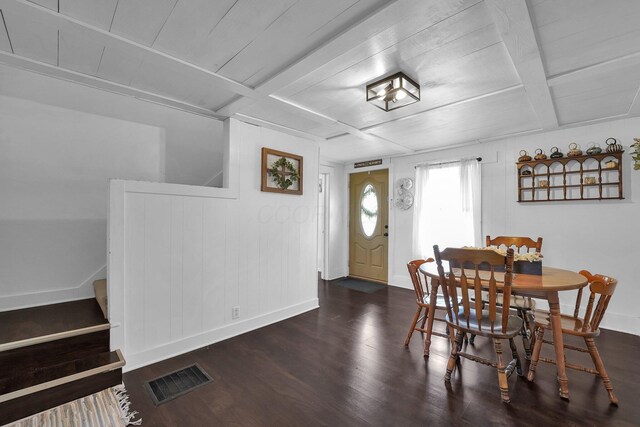 28 Elm St, Kingston, OH 45644 - dining space featuring visible vents, baseboards, beamed ceiling, and wood finished floors