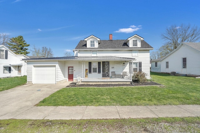 28 Elm St, Kingston, OH 45644 - view of front of house with a chimney, a garage, concrete driveway, a front yard, and covered porch