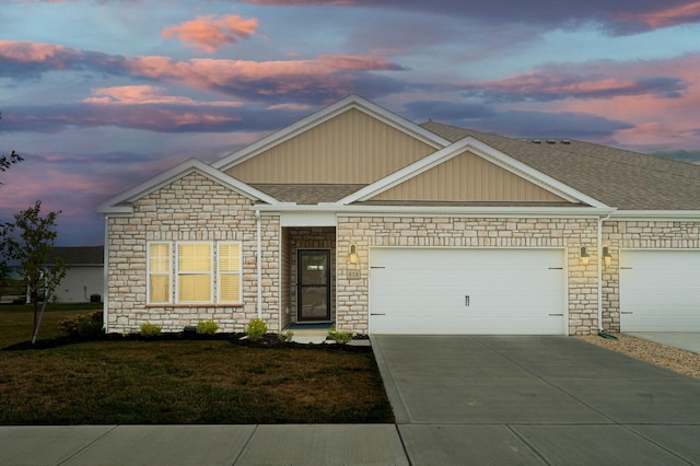 458 Madison Way, Plain City, OH 43064 - view of front facade with roof with shingles, an attached garage, stone siding, driveway, and a yard