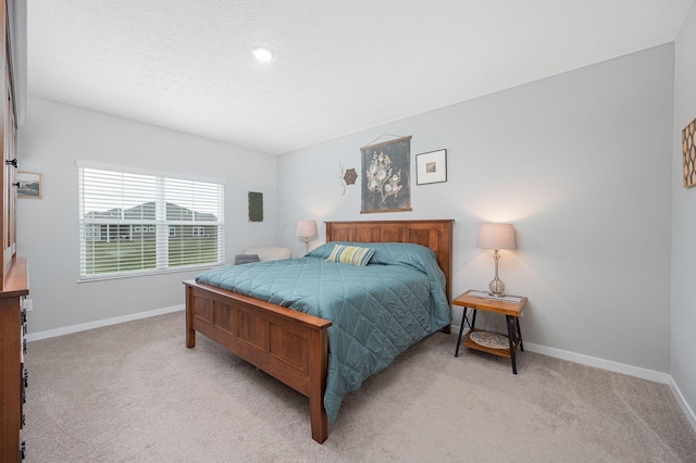 458 Madison Way, Plain City, OH 43064 - bedroom featuring light carpet, baseboards, and a textured ceiling