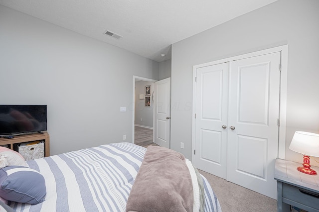 458 Madison Way, Plain City, OH 43064 - bedroom with light colored carpet, visible vents, and a closet