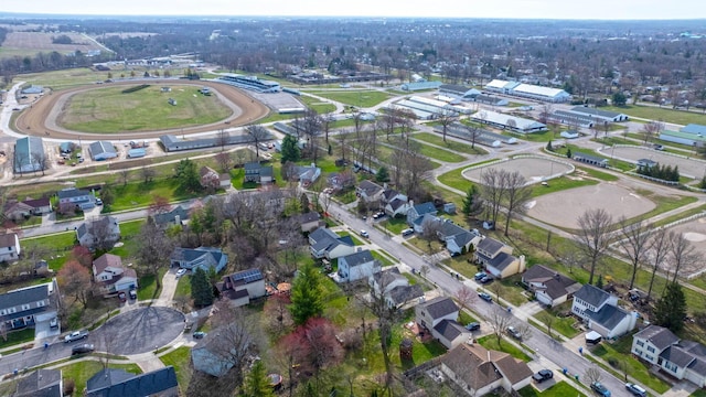 birds eye view of property with a residential view