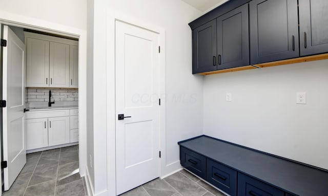 166 Miami Ave, Columbus, OH 43203 - mudroom with a sink and light tile patterned flooring