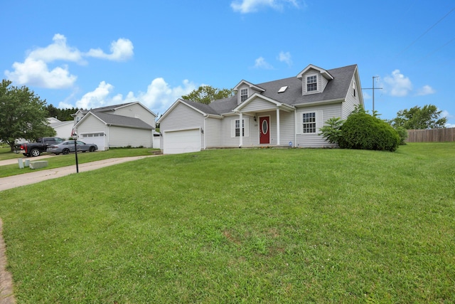 335 Mae St, Logan, OH 43138 - cape cod house with a garage, a shingled roof, and concrete driveway