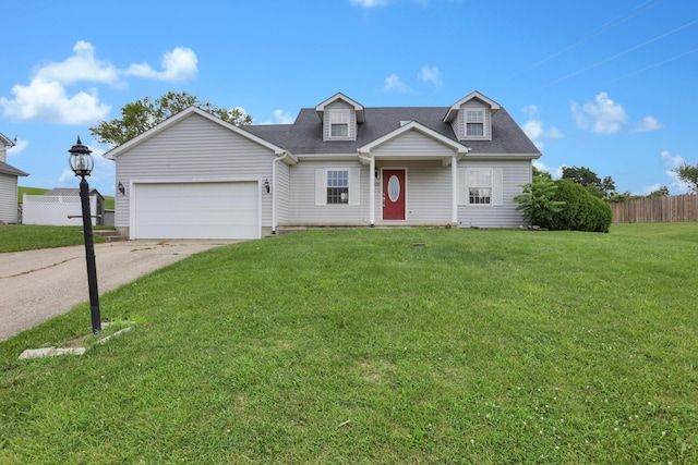335 Mae St, Logan, OH 43138 - cape cod home featuring driveway, an attached garage, and roof with shingles