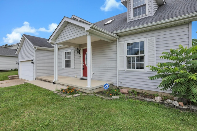335 Mae St, Logan, OH 43138 - view of front of home with a garage, a porch, roof with shingles, a front lawn, and driveway