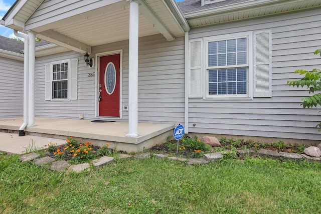 335 Mae St, Logan, OH 43138 - entrance to property with covered porch and roof with shingles