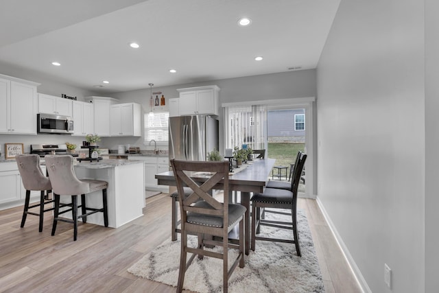 13334 Pine Rd NE, Thornville, OH 43076 - dining room featuring recessed lighting and light wood finished floors