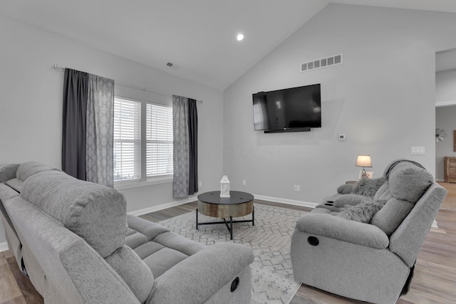 13334 Pine Rd NE, Thornville, OH 43076 - living area featuring high vaulted ceiling, wood finished floors, and recessed lighting