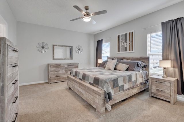 13334 Pine Rd NE, Thornville, OH 43076 - bedroom with light carpet and a ceiling fan