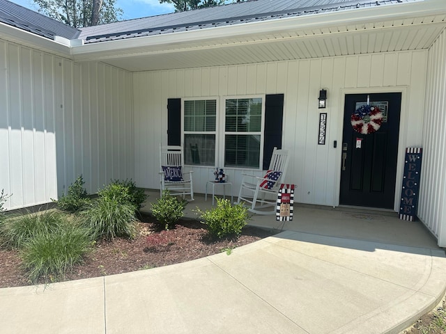 13334 Pine Rd NE, Thornville, OH 43076 - doorway to property with a porch and a metal roof
