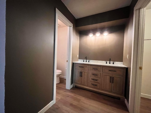 11795 Huntington Way NW, Pickerington, OH 43147 - bathroom with a sink, wood finished floors, and toilet