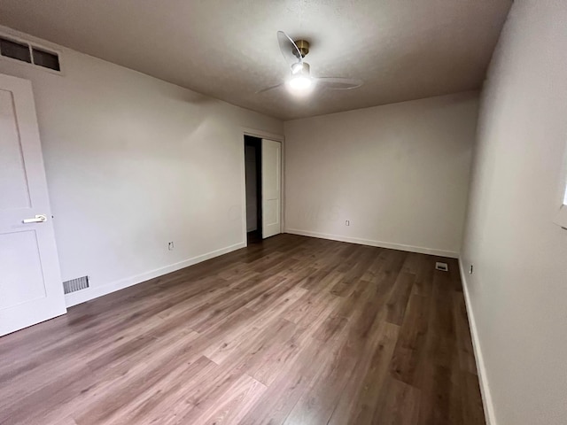11795 Huntington Way NW, Pickerington, OH 43147 - empty room featuring wood finished floors, a ceiling fan, and baseboards