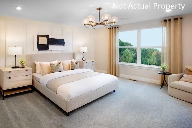 bedroom with baseboards, visible vents, a chandelier, and carpet flooring