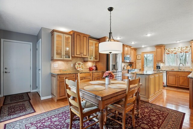 397 E Schrock Rd, Westerville, OH 43081 - dining area featuring baseboards and light wood-type flooring