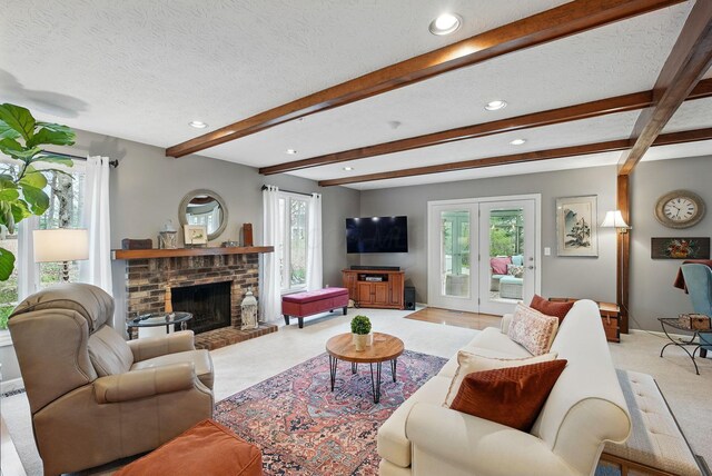 397 E Schrock Rd, Westerville, OH 43081 - living area featuring light carpet, a brick fireplace, a textured ceiling, baseboards, and beamed ceiling