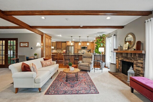 397 E Schrock Rd, Westerville, OH 43081 - living area featuring light colored carpet, recessed lighting, a brick fireplace, and beam ceiling