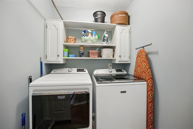 397 E Schrock Rd, Westerville, OH 43081 - laundry room featuring washing machine and clothes dryer and cabinet space