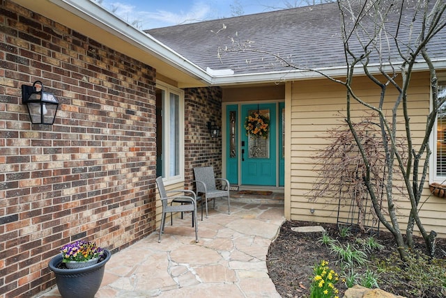397 E Schrock Rd, Westerville, OH 43081 - property entrance featuring brick siding and a shingled roof