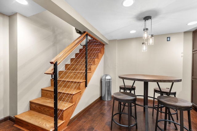 interior space with wood-type flooring, baseboards, and recessed lighting