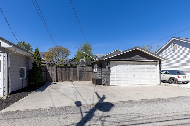 garage with fence