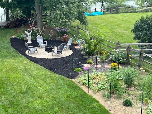 488 Springwood Lake Dr, Columbus, OH 43230 - view of yard featuring a fire pit, a vegetable garden, and a patio area