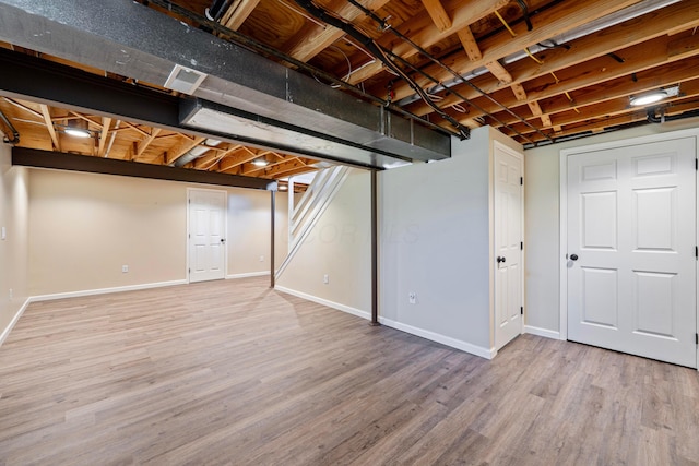 488 Springwood Lake Dr, Columbus, OH 43230 - finished basement featuring wood finished floors and baseboards