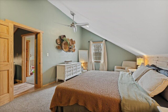 bedroom featuring a ceiling fan, carpet, and vaulted ceiling